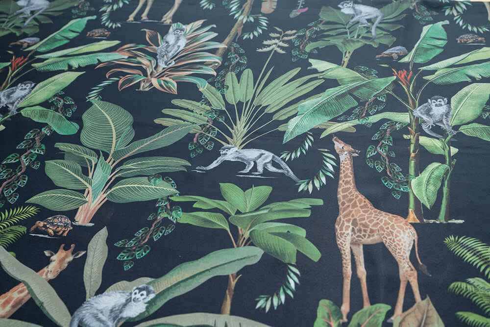 The Blossomry black fabric tablecloth with wild animal pattern for dining tables